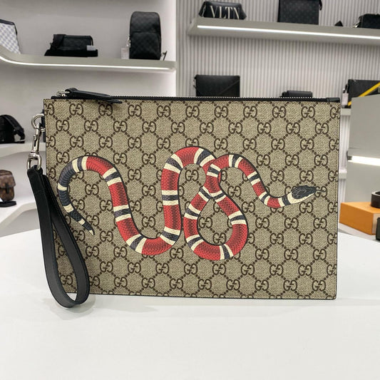 SNAKE MONOGRAM CLUTCH